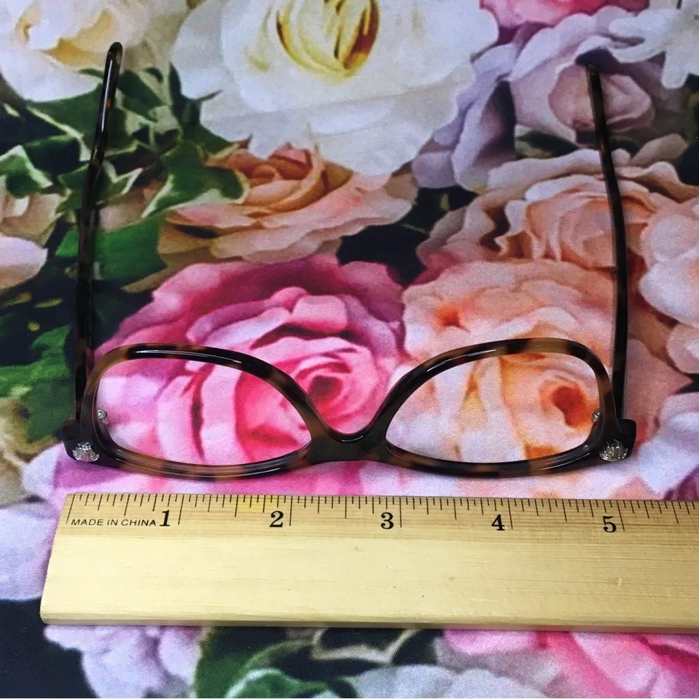 Versace orange & black tortoise frames glasses  Silver medusa face logo corners